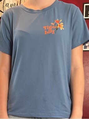 SHEIN Blue Tee with Orange Floral Logo